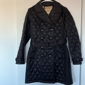 woman’s long burberry jacket
